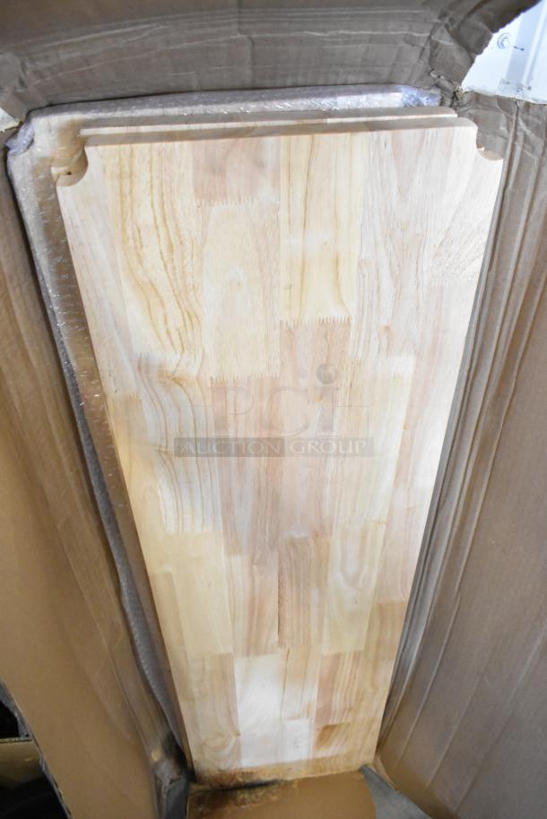Wooden under shelf cover, light natural finish, rectangular shape, new condition, partially wrapped in cardboard packaging.