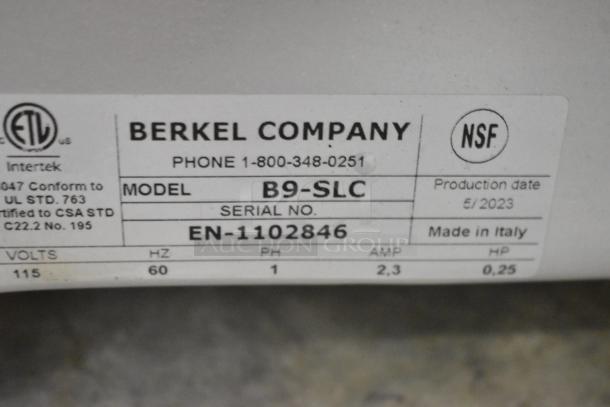 Berkel B9-SLC stainless steel meat slicer label, showing model and serial number. Made in Italy, 115 volts, 1 phase.