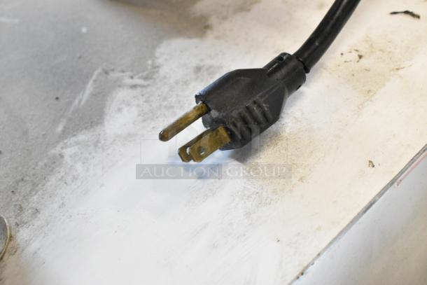 A black power plug for a DoughPro commercial dough press, suitable for 115 Volts, 1 Phase connection.