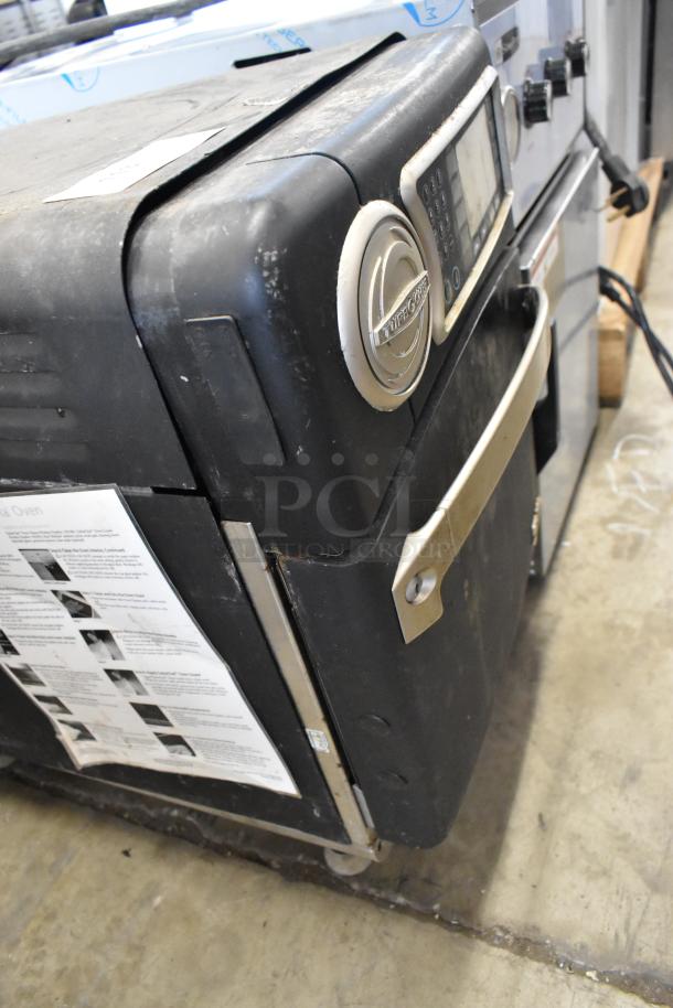 Turbochef NGO metal commercial countertop oven, electric-powered, 208/240V, 1 phase, showing wear on exterior.