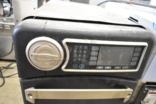 Turbochef NGO rapid cook oven, commercial countertop model. Features keypad and digital display. Electric, 208/240V, 1 phase.