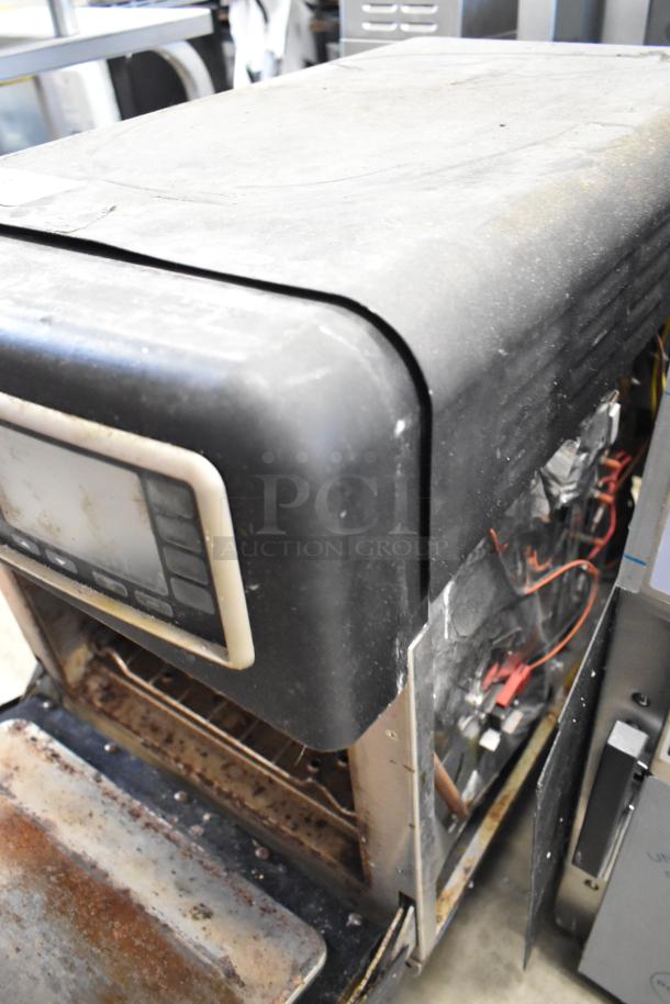 Turbochef NGO rapid cook oven, electric, countertop model, 208/240V, 1 phase. Visible wear and interior components.