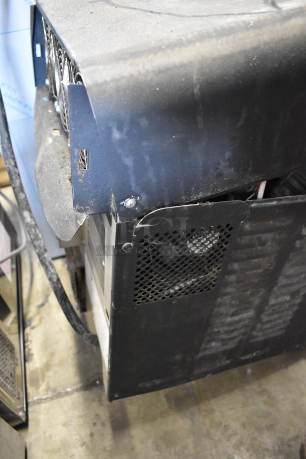Turbochef NGO commercial rapid cook oven, metal exterior; 208/240 volts, 1 phase; used condition, visible wear.
