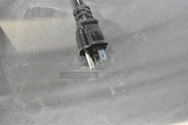 Brand new Cooking Performance Group CPG 351CHCT1A plug on stainless steel surface; counter-top oven; 120V, 1-phase.