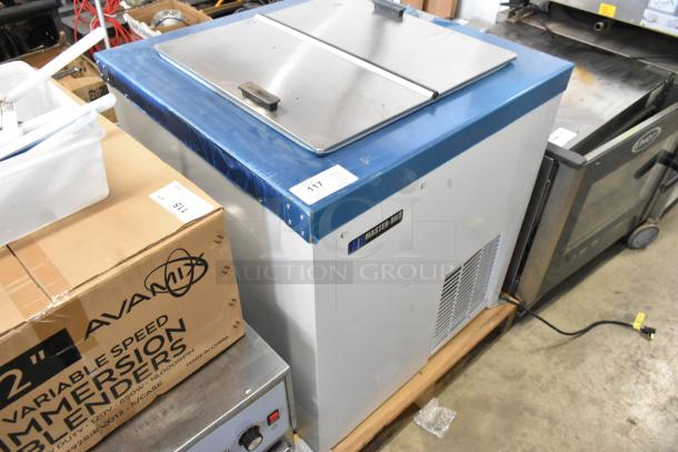 Brand new 2022 Master-Bilt DC-4D metal commercial chest freezer, 115 volts, 1 phase, shown in pristine condition.