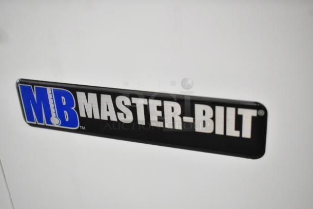 Brand new 2022 Master-Bilt DC-4D commercial chest freezer, 115 volts, 1 phase, with visible logo plate.