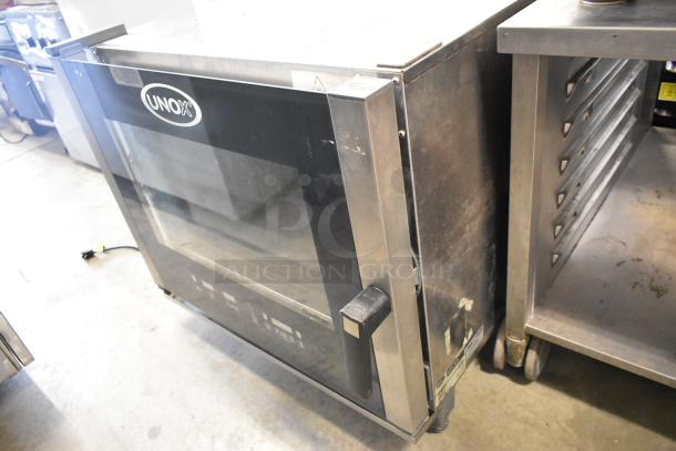 Unox Cadco XAV305 stainless steel commercial countertop convection oven, electric powered, 208-240 volts, visible wear.
