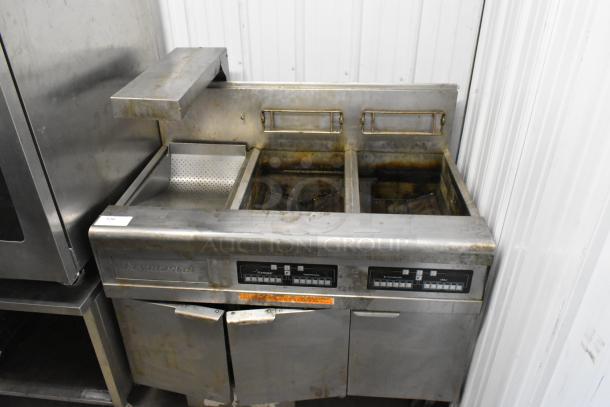 Frymaster FMPH255CSC stainless steel 2-bay deep fryer with filtration system, dumping station, and commercial casters, 80,000 BTU.