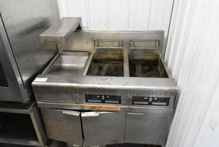 Frymaster FMPH255CSC stainless steel 2-bay deep fryer with filtration system, dumping station, and commercial casters, 80,000 BTU.