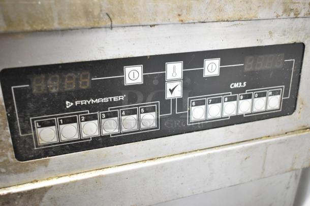 Frymaster FMPH255CSC control panel, showing function buttons and digital displays on stainless steel fryer.