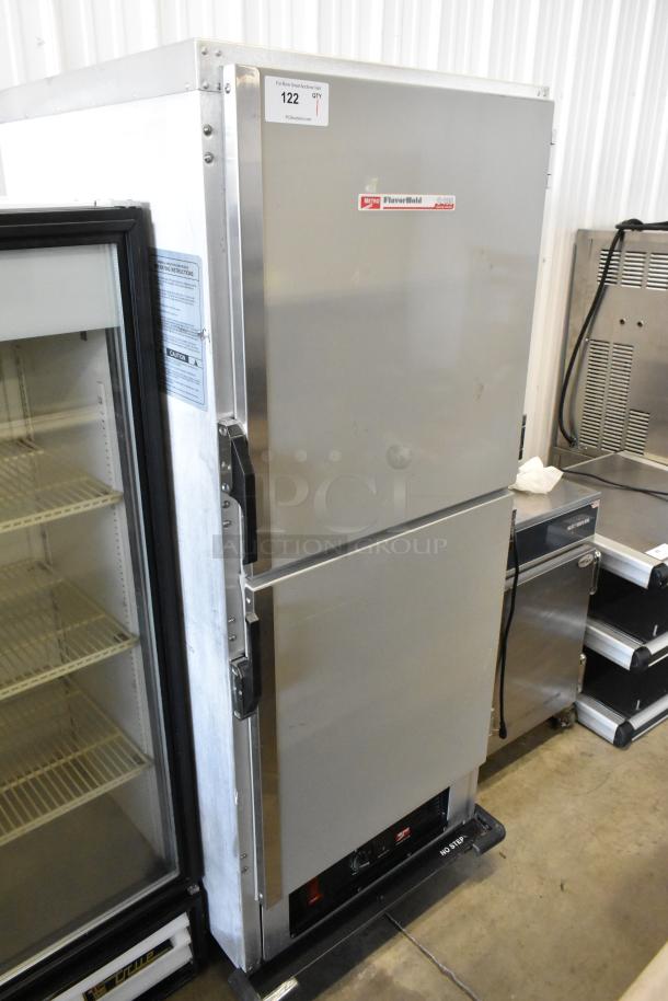 Metro C199-M(1)N-B heated holding cabinet, 2 half-size doors, metal, on commercial casters. 120 volts, 1 phase, good condition.