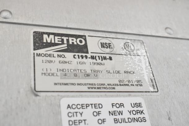 Metro C199-M(1)N-B metal commercial heated holding cabinet label, showing model and specifications.