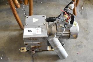 Industrial motor in used condition, visible wiring, metal casing, auction label number 127 from PCI Auctions.