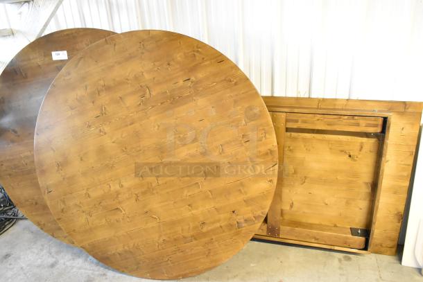 Three brand new wooden folding tables: two round, one rectangular. Includes sizes 60x60x5 and 108x40x5.