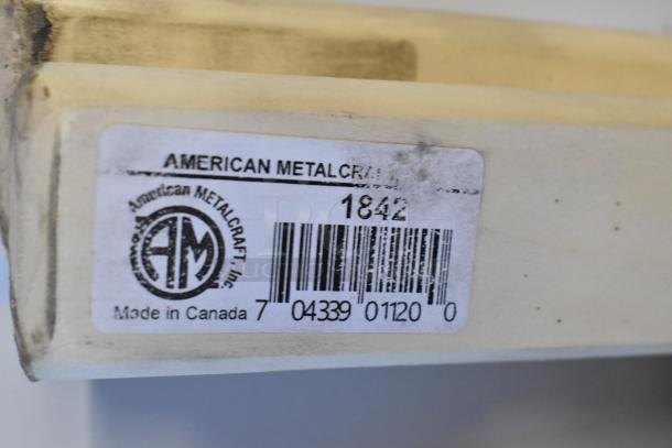 Label on American Metalcraft wood pizza peel model 1842, showing barcode and "Made in Canada" text.