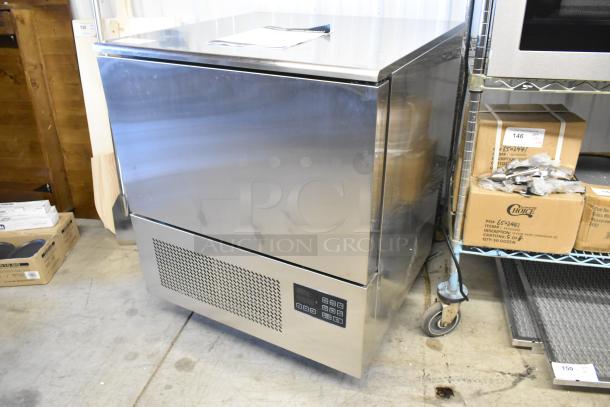 Brand new KoolMore KM-CBLC-5 commercial stainless steel blast chiller with 5-pan capacity, ETL certified, minor scratches.
