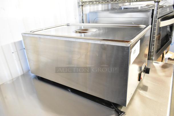 KoolMore CFW-4 stainless steel food warmer, brand new with scratch and dent. 110 volts, 1 phase.