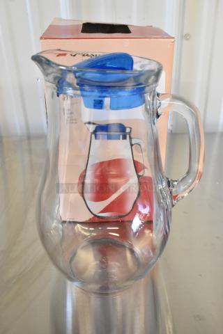 4 new Pasabahce Bistro 61 oz. glass pitchers by Steelite. Features scratch and dent. Blue lid, clear glass, original packaging.