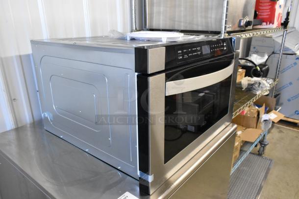 Brand new KoolMore KM-MD-1SS stainless-steel microwave drawer. 120 Volts, 1 Phase. Visible controls, slight cosmetic dents.