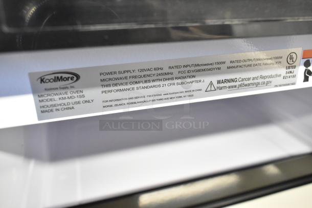 KoolMore KM-MD-1SS stainless steel microwave drawer, new with scratch and dent. Label shows model and power details.
