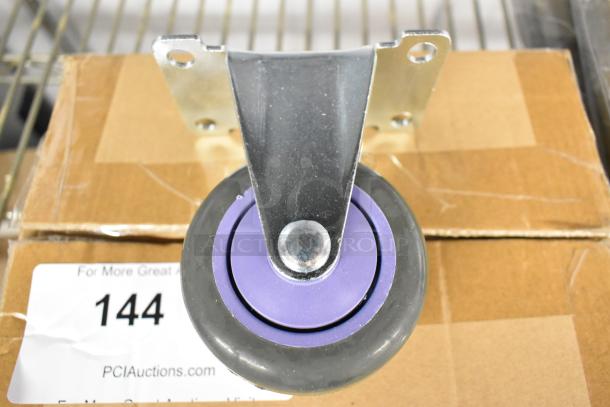 Lot of 4 brand new commercial casters, scratch and dent, purple and grey wheels, metal mounts, auction tag number 144 visible.