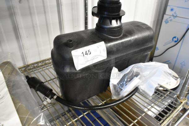 BRAND NEW Flushmate M-101526-F3-A 503 Series 1.6 GPF replacement system, slight scratches, auction tag "145" visible.