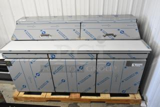 BRAND NEW Avantco 447APST72 prep table, scratch and dent, stainless steel, mega top, with casters, Novacel film visible.