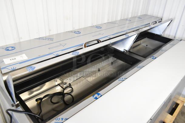 Avantco 447APST72 stainless steel sandwich prep table, new scratch and dent, with commercial casters, 115V, 1 Phase.