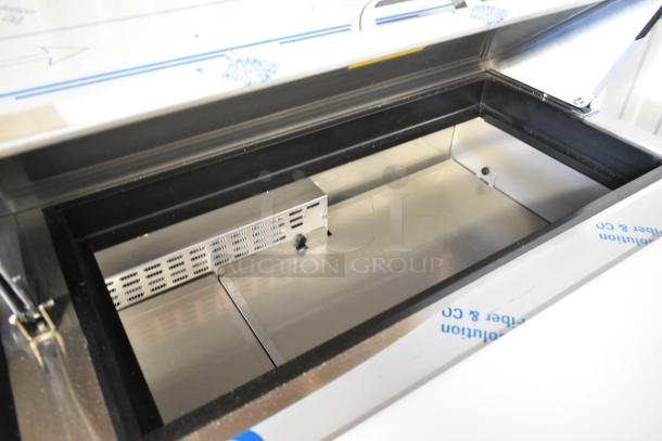 BRAND NEW Avantco 447APST72 stainless steel salad prep table, bain marie top, with commercial casters, 115V, scratch and dent.