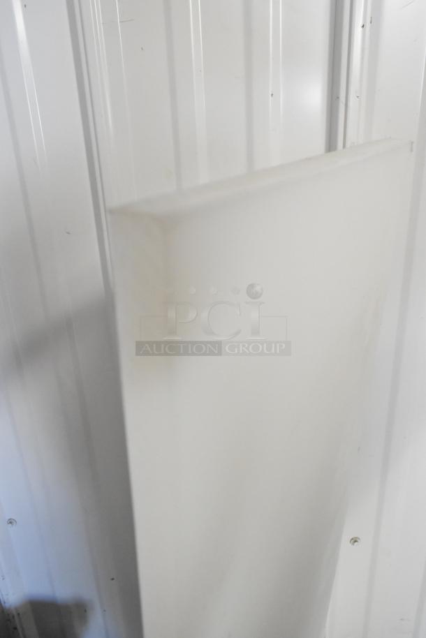 Brand new Avantco 178CBS1060 cutting board, 60 1/8" x 11 1/2", slight scratch and dent, pristine surface visible.