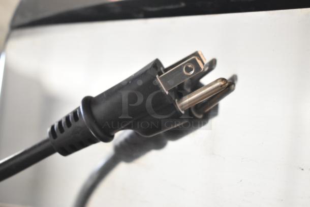 Close-up of power plug from a 2018 Citrocasa 8000XB stainless steel commercial citrus juicer, 115-120V, 1 phase.