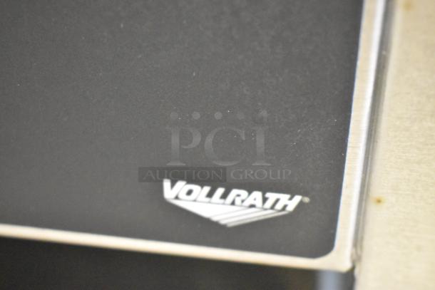 Vollrath JT3H stainless steel countertop conveyor toaster oven logo close-up, 220 volts, 1 phase.