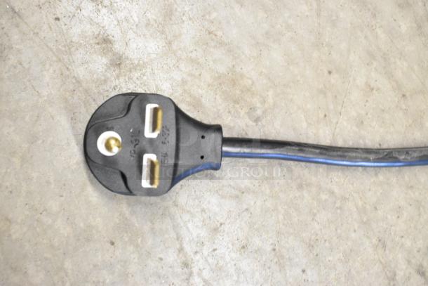 Close-up of a 220-volt power plug for a Vollrath JT3H conveyor toaster oven.