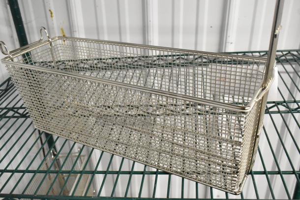 Brand new Pitco® P6072185 triple size fryer basket, 17 1/4" x 5 1/2" x 5 3/4", front hook, scratch and dent condition.