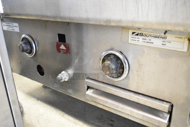 Stainless Steel Southbend countertop griddle, model HDG-24, gas powered, visible pilot light control, commercial use.