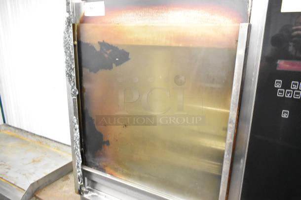 Fri-jado TDR7-P commercial rotisserie oven, stainless steel, electric, 208V, on casters. Visible broken glass damage.