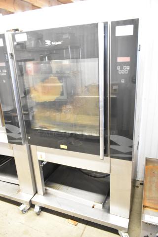 Fri-jado TDR7-P stainless steel electric rotisserie oven on casters, 208V, 3 phase, commercial use, floor style.