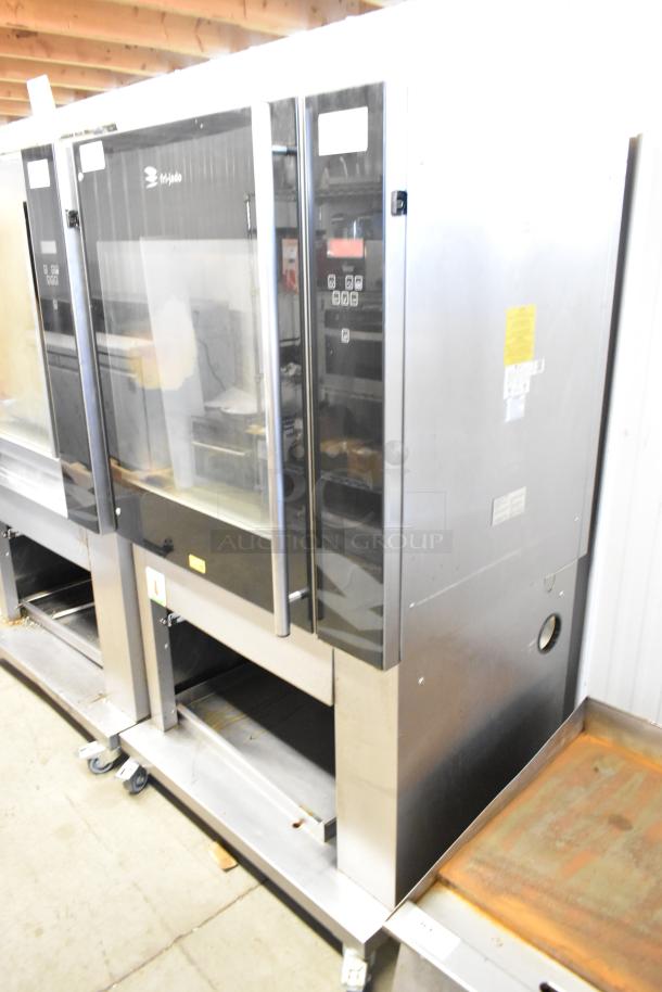 Fri-jado TDR7-P stainless steel electric rotisserie oven on casters, 208V, 3 phase, commercial use, clear control panel.