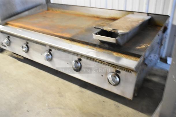 Star Ultra Max Stainless Steel Commercial Gas Griddle; rust visible, five control knobs, countertop model, worn condition.