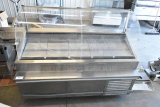 Traulsen TD078HT-ZSC01 stainless steel seafood display case, 115V, 1 phase. Commercial floor style, good condition.