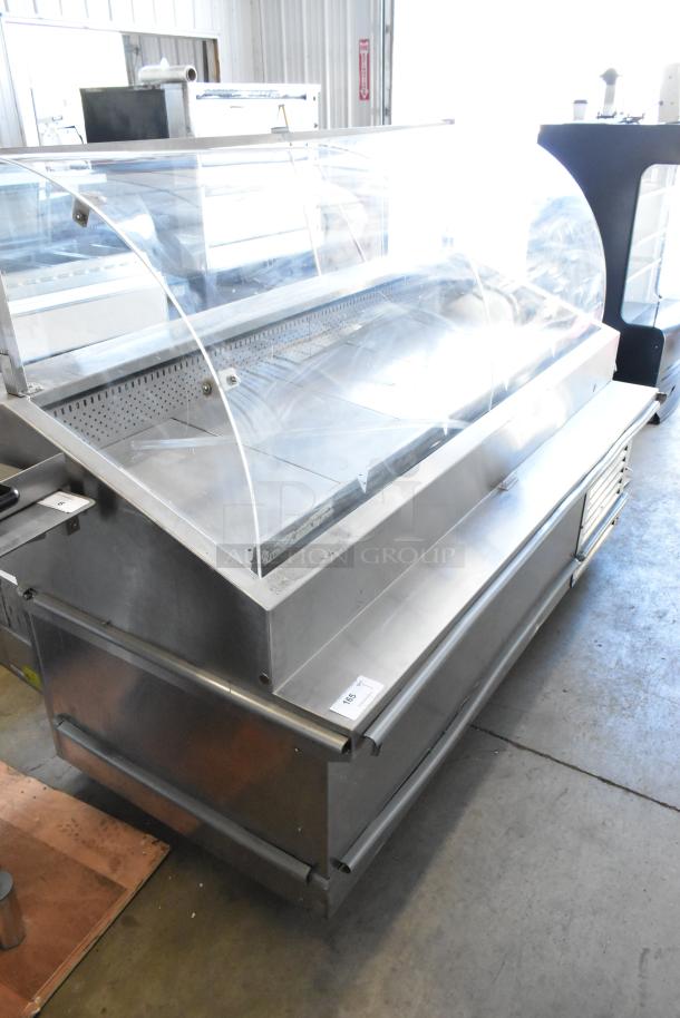 Traulsen TD078HT-ZSC01 stainless steel seafood display case, floor style, 115V, 1 phase, showcases clear curved glass top.