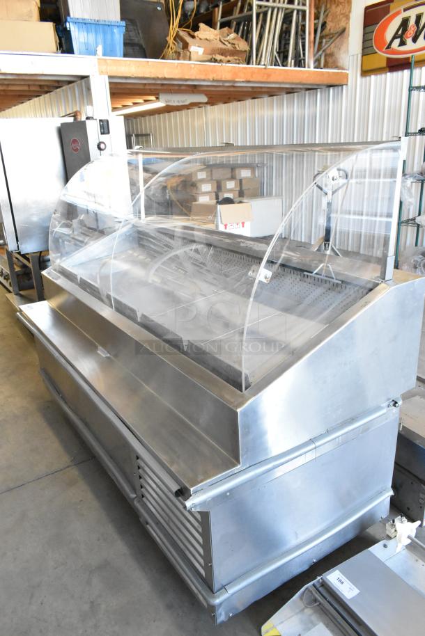 Traulsen TD078HT-ZSC01 stainless steel seafood display case, commercial floor style, 115V, 1-phase, excellent condition.