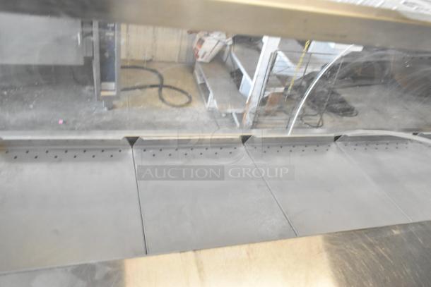 Traulsen TD078HT-ZSC01 stainless steel seafood display case, commercial floor style, 115V, 1 phase, clear viewing panels.