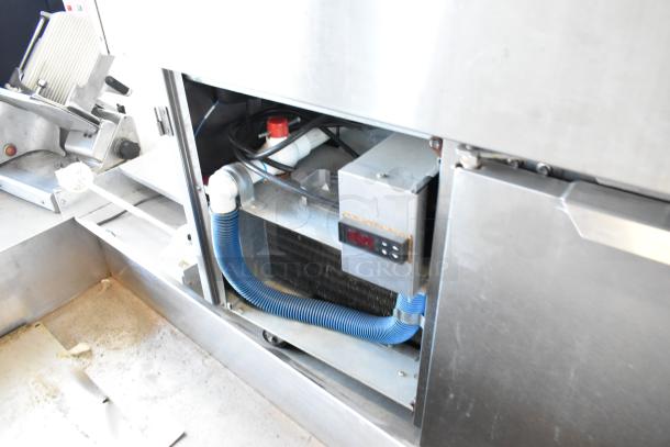 Traulsen TD078HT-ZSC01 stainless steel seafood display case, 115V, 1-phase, showing interior components and digital controls.