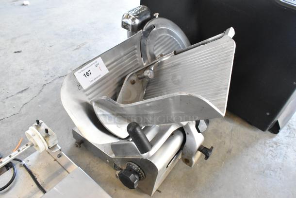 Globe stainless steel commercial countertop meat slicer with blade sharpener, 115 volts, 1 phase, visible auction tag 167.
