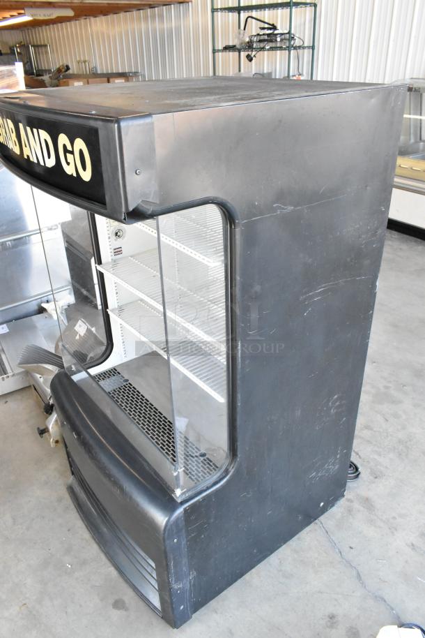 2017 True TAC-14GS-LD merchandiser, black, metal, open grab and go, 115V, 1 phase, shelves, "Grab and Go" sign, used condition.