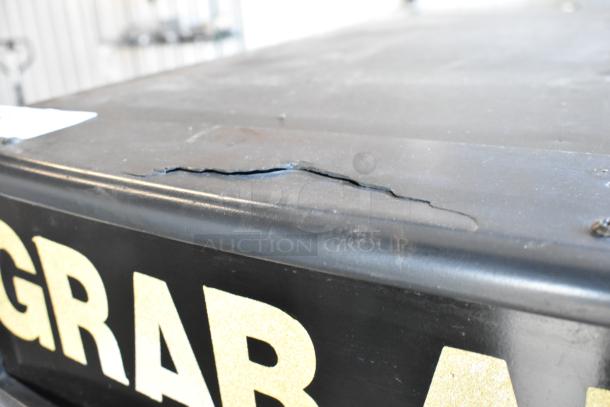 2017 True TAC-14GS-LD Merchandiser; damaged top surface with visible crack; "GRAB" text; 115 Volts, 1 Phase.