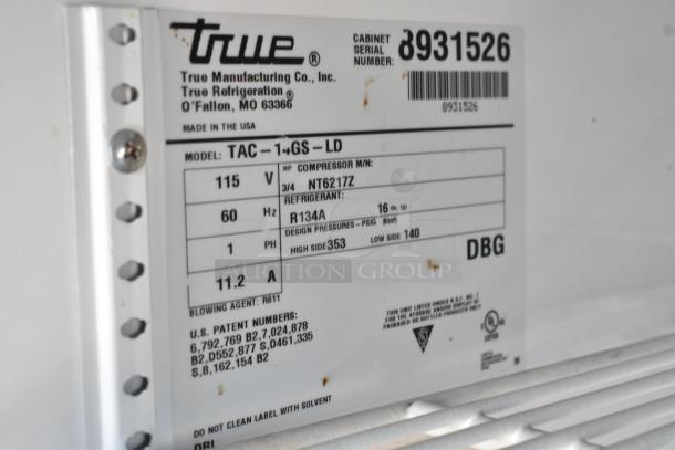 Label of 2017 True TAC-14GS-LD merchandiser, 115V, 1 Phase, showing model, refrigerant, and serial number details.