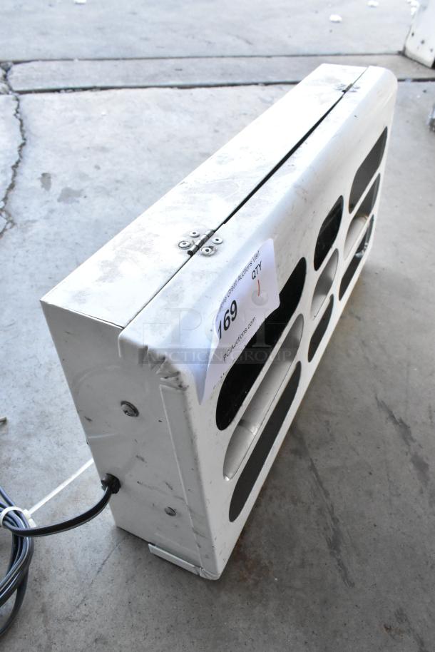 GT-180 Metal Bug Zapper, 115V, 1 Phase. Visible scuffs and wear. Tag marked with "169" and auction details.