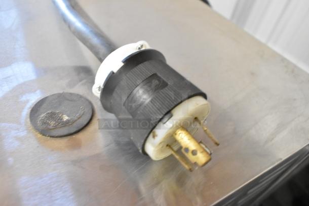 Cleveland 21CET8 SteamCraft Ultra 3 plug and power cord on stainless steel surface. 208 Volts, 3 Phase.
